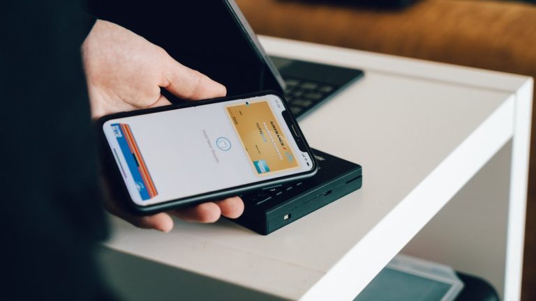 person holding black android smartphone
